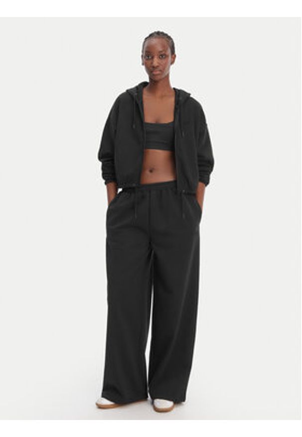Reebok Spodnie dresowe Reebok x Ewa Chodakowska RK25624CCW Czarny Wide Leg. Kolor: czarny. Materiał: bawełna