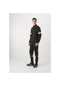 Dres treningowy męski Puma 65865303. Kolor: czarny, wielokolorowy, biały. Materiał: dresówka. Sport: piłka nożna #1