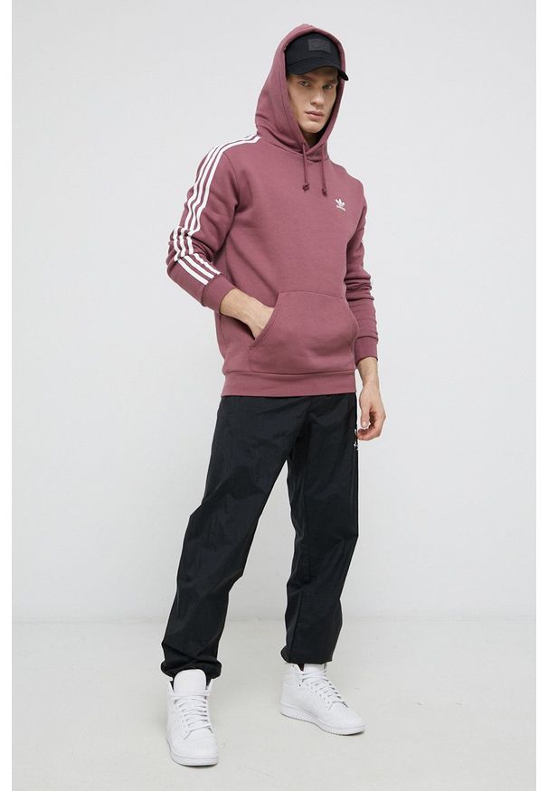 adidas Originals Bluza męska kolor różowy z kapturem gładka. Typ kołnierza: kaptur. Kolor: różowy. Materiał: dzianina, poliester. Wzór: gładki