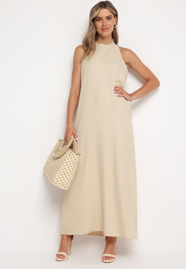 Born2be - Beżowa Sukienka z Wiązaniem na Szyi i Kieszeniami o Trapezowym Kroju Nestatasha. Kolor: beżowy. Typ sukienki: trapezowe