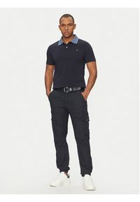 Guess Spodnie materiałowe M5RB54 WGXY1 Granatowy Slim Fit. Kolor: niebieski. Materiał: bawełna