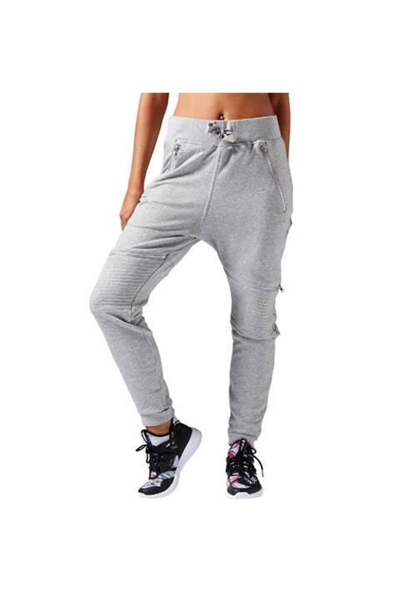 Spodnie sportowe damskie Reebok Dance Knit Moto. Kolor: szary. Materiał: dresówka. Długość: długie