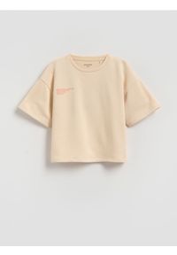 Reserved - Luźny t-shirt z nadrukiem - beżowy. Kolor: beżowy. Materiał: bawełna. Wzór: nadruk