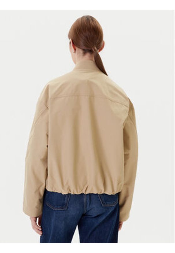 TOMMY HILFIGER - Tommy Hilfiger Kurtka bomber WW0WW45619 Beżowy Relaxed Fit. Kolor: beżowy. Materiał: bawełna