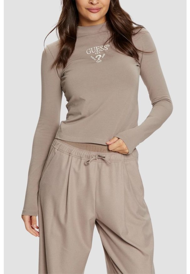 Guess - GUESS Beżowy damski longsleeve Colette Tee. Kolor: beżowy. Długość rękawa: długi rękaw