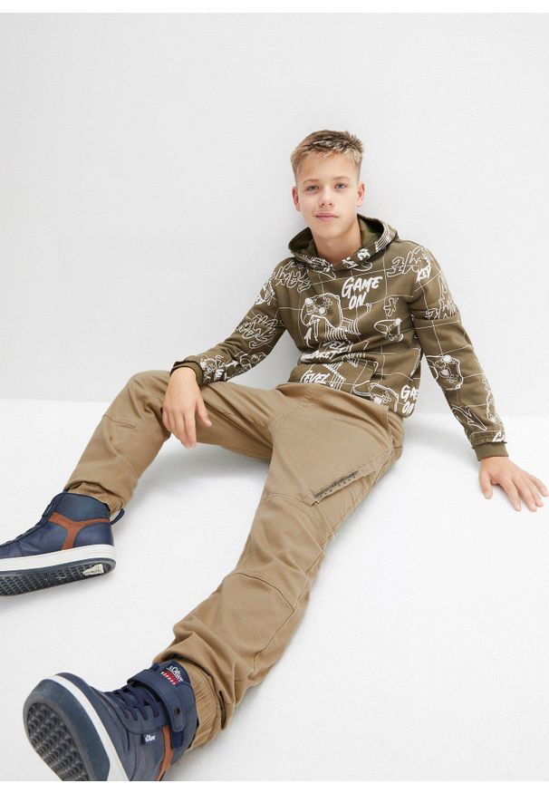 bonprix - Spodnie typu loose fit z podszewką z dżerseju. Kolor: zielony. Materiał: jersey