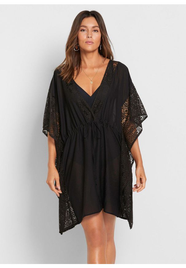 bonprix - Prześwitująca tunika plażowa. Okazja: na plażę. Kolor: czarny. Materiał: koronka. Wzór: koronka