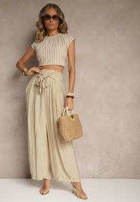 Renee - Beżowe Wiskozowe Spodnie High Waist o Szerokim Kroju Aranisa. Okazja: na co dzień. Stan: podwyższony. Kolor: beżowy. Materiał: wiskoza. Wzór: aplikacja. Styl: elegancki, casual