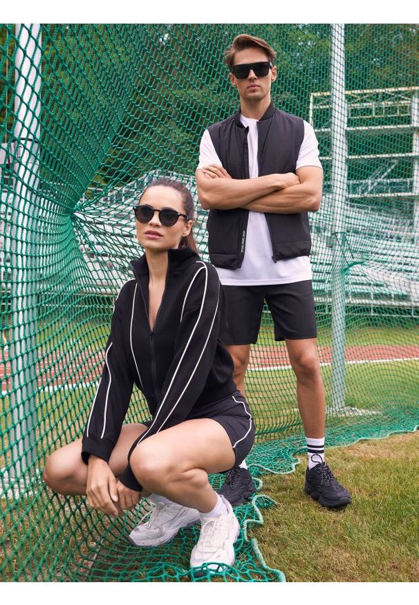 Sinsay - Szorty sportowe SNSY PERFORMANCE - czarny. Kolor: czarny. Styl: sportowy