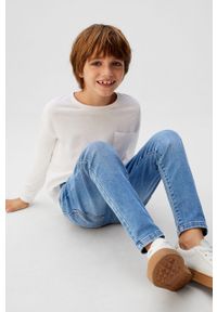 Mango Kids - Jeansy dziecięce Comfy 110-164 cm. Kolor: niebieski. Materiał: jeans #5