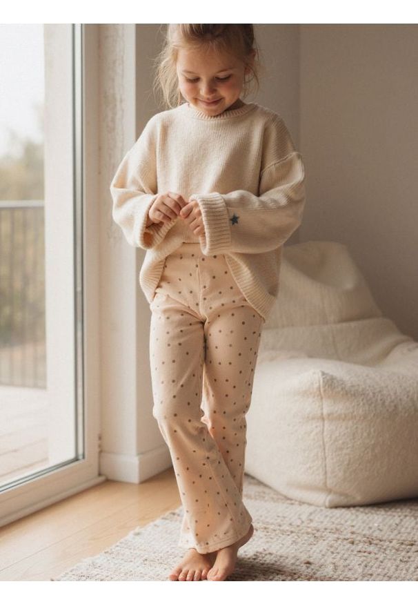 Sinsay - Prążkowane spodnie flare - kremowy. Kolor: kremowy. Materiał: prążkowany