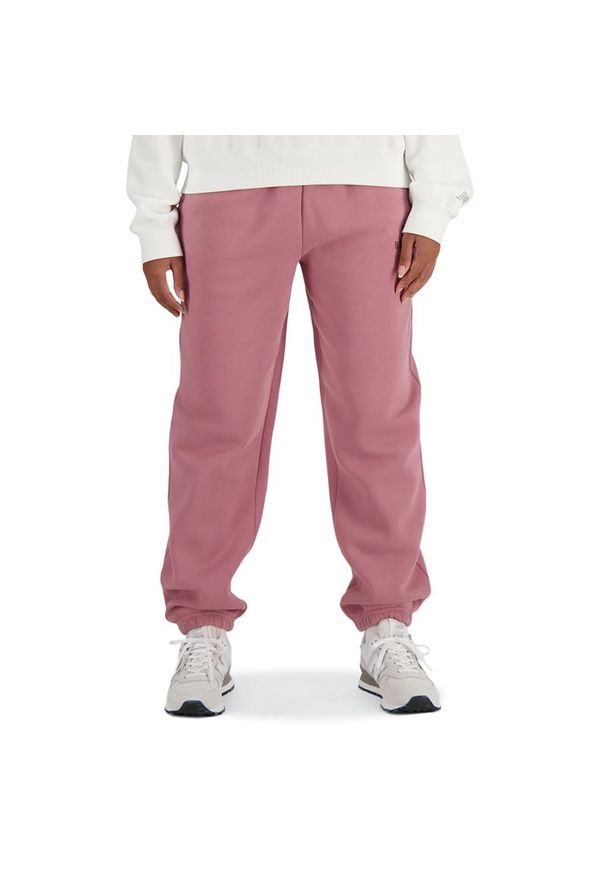Spodnie New Balance WP41508RSE - różowe. Kolor: różowy. Materiał: bawełna, poliester, dresówka