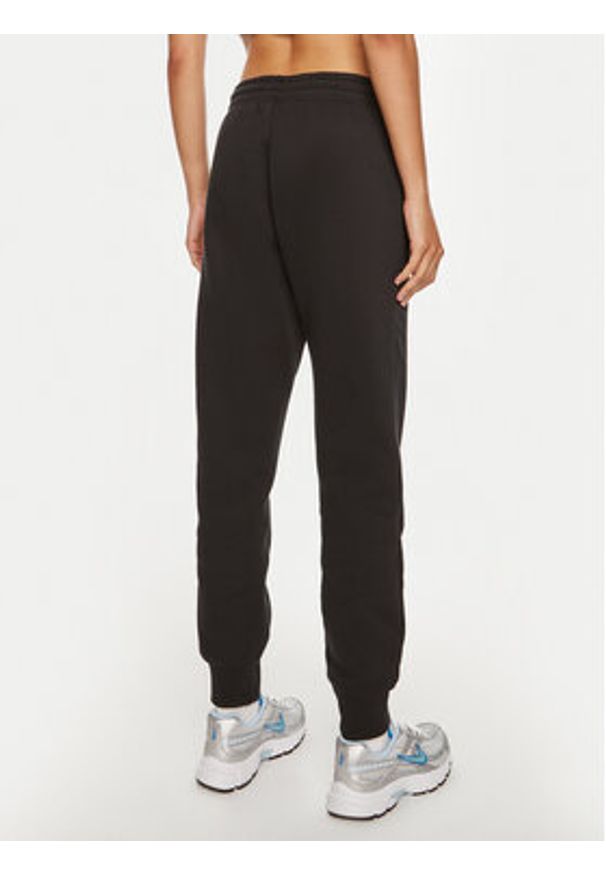 Nike Spodnie dresowe FZ7626 Czarny Regular Fit. Kolor: czarny. Materiał: bawełna
