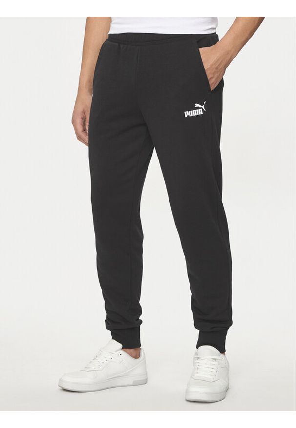 Puma Spodnie dresowe Ess Logo 586716 Czarny Regular Fit. Kolor: czarny. Materiał: bawełna, syntetyk