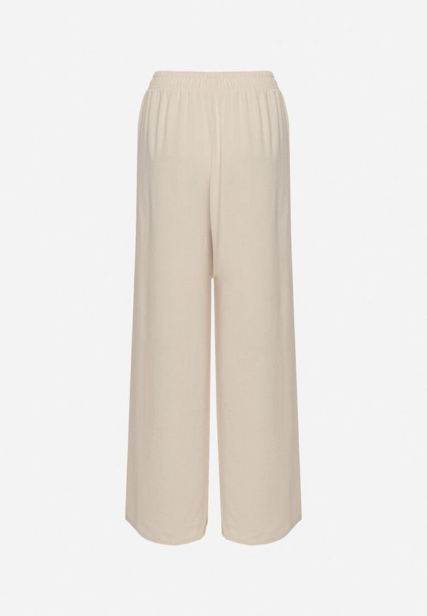 Born2be - Jasnobeżowe Szerokie Spodnie z Gumką w Pasie Sliverta. Kolor: beżowy