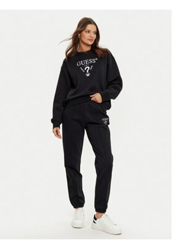 Guess Spodnie dresowe V5RB13 KC3D2 Czarny Regular Fit. Kolor: czarny. Materiał: bawełna, syntetyk