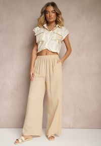 Renee - Beżowe Spodnie Palazzo o Szerokim Kroju High Waist Ollevia. Okazja: na spotkanie biznesowe, na co dzień. Stan: podwyższony. Kolor: beżowy. Materiał: jedwab. Wzór: aplikacja. Styl: casual, elegancki, biznesowy