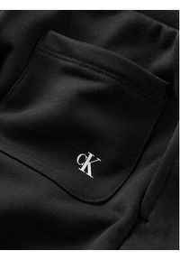 Calvin Klein Jeans Spodnie dresowe Logo IU0IU00604 Czarny Regular Fit. Kolor: czarny. Materiał: bawełna #11