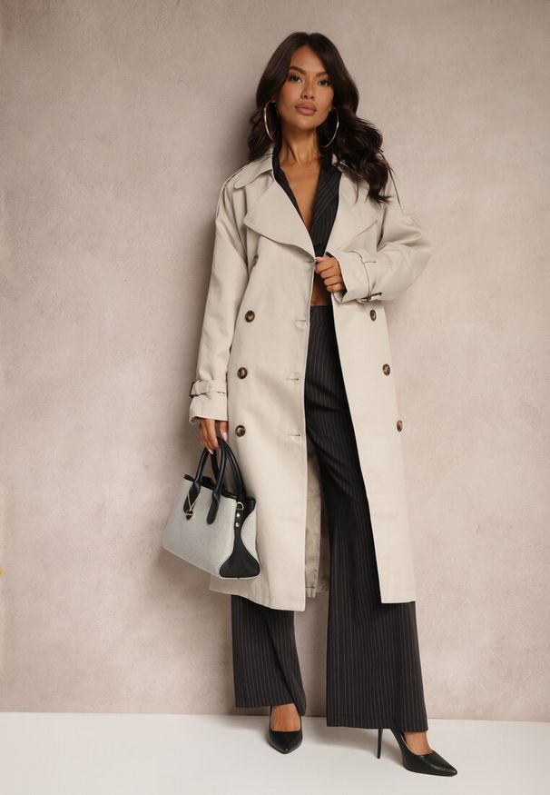 Renee - Jasnobeżowy Oversizowy Płaszcz Trencz o Dwurzędowym Kroju z Paskiem Darinella. Okazja: na co dzień. Kolor: beżowy. Materiał: jeans. Styl: casual, elegancki