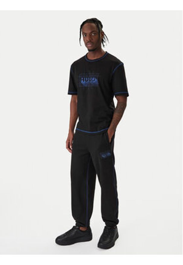 Hugo - HUGO Spodnie dresowe Notharos 50553508 Czarny Regular Fit. Kolor: czarny. Materiał: bawełna