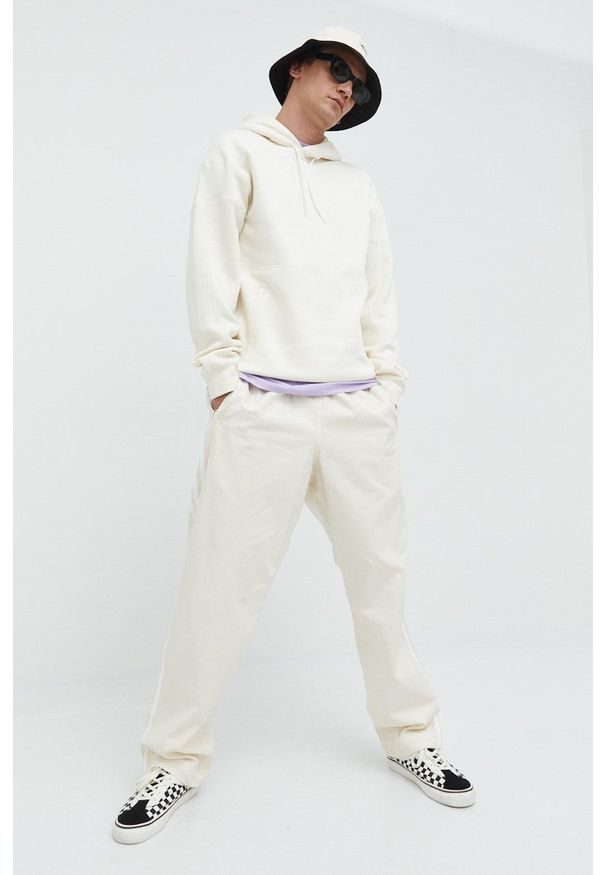 adidas Originals bluza Adicolor męska kolor beżowy z kapturem gładka. Typ kołnierza: kaptur. Kolor: beżowy. Materiał: bawełna, materiał. Wzór: gładki