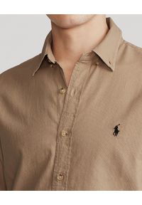 Ralph Lauren - RALPH LAUREN - Beżowa koszula z logo Slim Fit Dobby. Typ kołnierza: polo. Kolor: beżowy. Materiał: bawełna. Długość rękawa: długi rękaw. Długość: długie. Wzór: haft. Styl: klasyczny