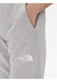 The North Face Spodnie dresowe Reaxion NF0A7ZAB Szary Regular Fit. Kolor: szary. Materiał: bawełna #7
