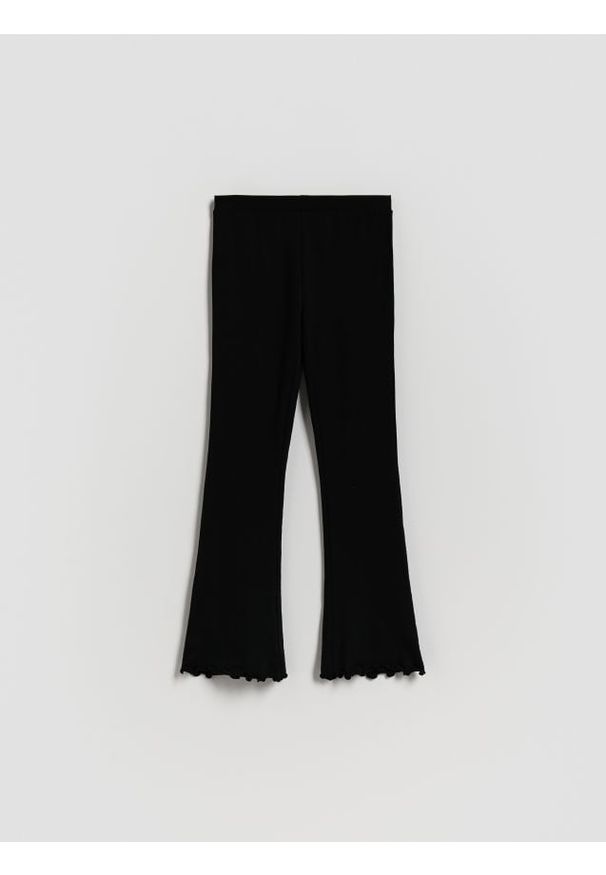 Reserved - Legginsy flare - czarny. Kolor: czarny. Materiał: dzianina, bawełna