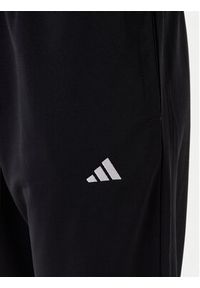 Adidas - adidas Dres Essentials Feel Cozy JD4475 Czarny Regular Fit. Kolor: czarny. Materiał: syntetyk