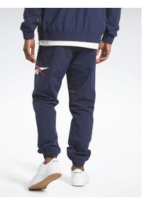 Reebok Spodnie dresowe Classics Vector IA2511 Niebieski Regular Fit. Kolor: niebieski. Materiał: dresówka, syntetyk #7