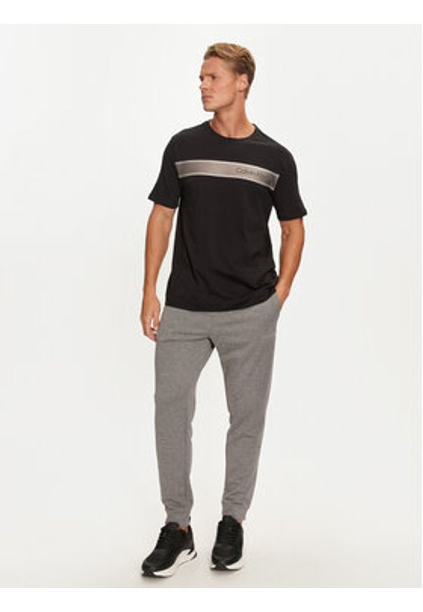 Calvin Klein Performance Spodnie dresowe 00GMS4P634 Szary Regular Fit. Kolor: szary. Materiał: syntetyk