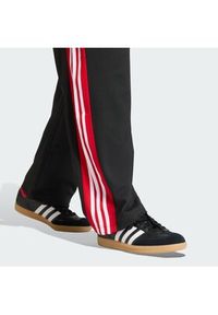 Adidas - adidas Spodnie dresowe KE0117 Czarny Loose Fit. Kolor: czarny. Materiał: syntetyk #2