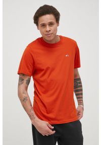 Tommy Jeans T-shirt bawełniany kolor pomarańczowy gładki. Okazja: na co dzień. Kolor: pomarańczowy. Materiał: bawełna. Wzór: gładki. Styl: casual
