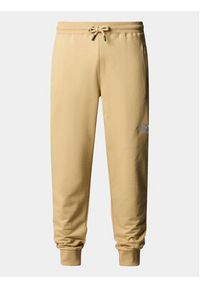 The North Face Spodnie dresowe Nse Light NF0A4T1F Beżowy Regular Fit. Kolor: beżowy. Materiał: bawełna #3