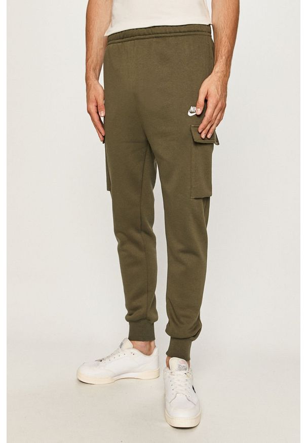 Nike Sportswear - Spodnie. Kolor: brązowy. Materiał: bawełna, poliester, dzianina