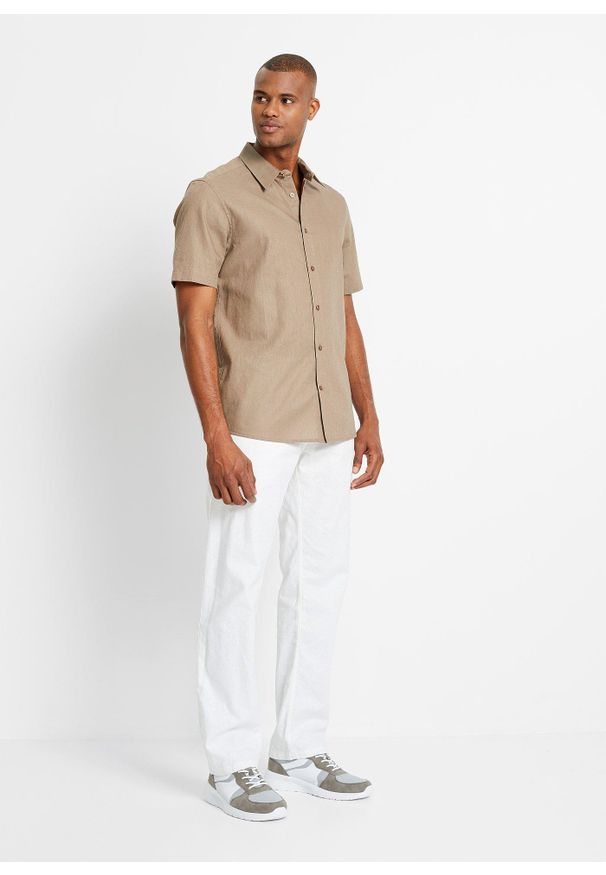 bonprix - Spodnie ze sznurkiem w pasie, z przewiewnej mieszanki lnu o prostych nogawkach i kroju relaxed fit. Kolor: biały. Materiał: materiał, len