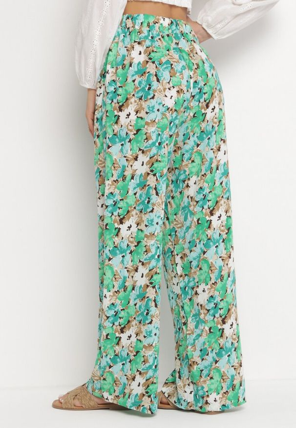 Born2be - Zielone Szerokie Spodnie z Gumką w Pasie i Materiałowym Paskiem oraz Kieszeniami Rallia. Kolor: zielony. Materiał: materiał