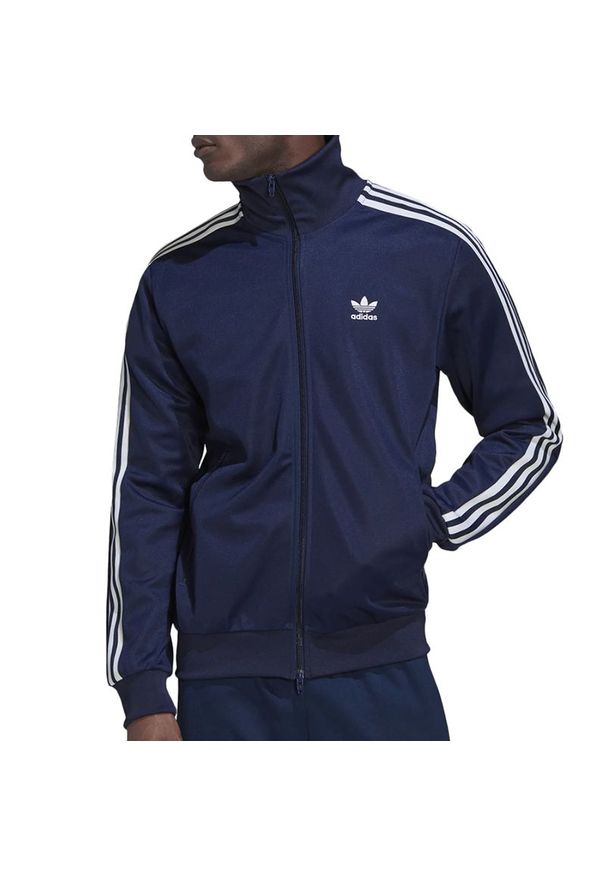Adidas - Bluza adidas Originals Adicolor Classics Beckenbauer Primeblue Track Top HK7364 - granatowa. Kolor: niebieski. Materiał: bawełna, dresówka, poliester, tkanina. Wzór: paski, gładki. Sezon: lato. Styl: klasyczny. Sport: piłka nożna
