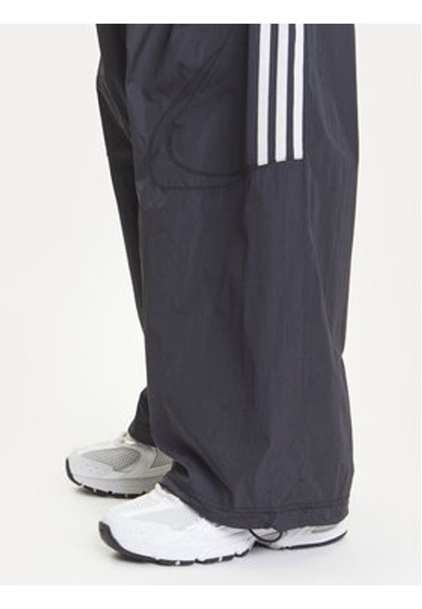 Adidas - adidas Spodnie dresowe adicolor Teamgeist JD0256 Czarny Oversize. Kolor: czarny. Materiał: syntetyk