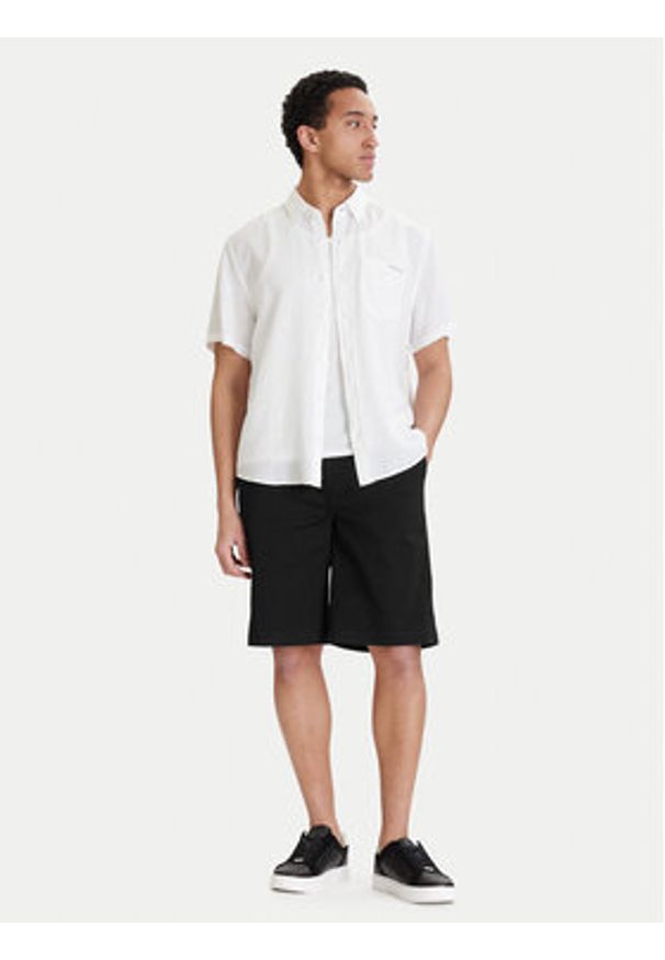 Calvin Klein Jeans Szorty materiałowe 90s LV04RD603G Czarny Baggy Fit. Kolor: czarny. Materiał: bawełna