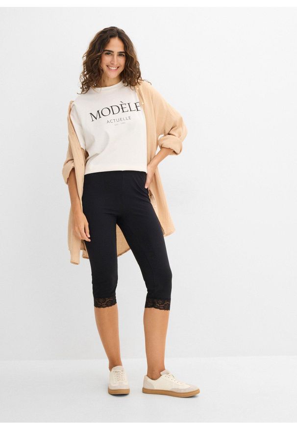 bonprix - Legginsy rybaczki z ozdobną koronką. Kolor: czarny. Materiał: koronka. Wzór: koronka