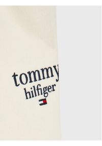 TOMMY HILFIGER - Tommy Hilfiger Spodnie dresowe Graphic KG0KG06866 M Écru Tapered Fit. Materiał: bawełna