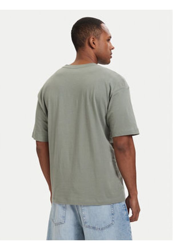 TOMMY HILFIGER - Tommy Hilfiger T-Shirt UM0UM03643 Zielony jasny Regular Fit. Kolor: zielony. Materiał: bawełna