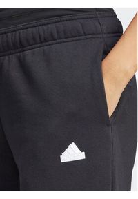 Adidas - adidas Spodnie dresowe Dance All-Gender IN1830 Czarny Regular Fit. Kolor: czarny. Materiał: bawełna #4
