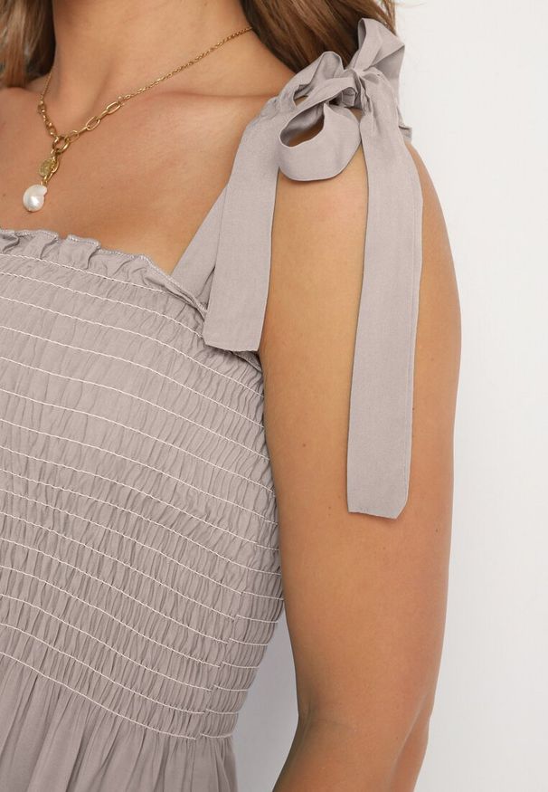 Born2be - Beżowa Rozkloszowana Sukienka z Bawełny z Gumką w Talii na Ramiączkach Gelfea. Kolor: beżowy. Materiał: bawełna. Długość rękawa: na ramiączkach. Typ sukienki: rozkloszowane. Styl: klasyczny