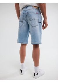 Big-Star - Szorty męskie jeansowe z przetarciami jasnoniebieskie Aleksy Workwear 220. Okazja: na co dzień. Stan: podwyższony. Kolor: niebieski. Materiał: jeans. Sezon: lato. Styl: vintage, klasyczny, casual