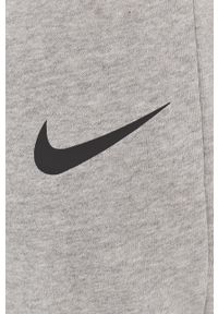 Nike Spodnie męskie kolor szary gładkie. Kolor: szary. Materiał: tkanina, włókno, dzianina, skóra. Technologia: Dri-Fit (Nike). Wzór: gładki #5