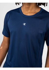 Champion T-Shirt | 217089 | Mężczyzna | Granatowy. Okazja: na co dzień. Kolor: niebieski. Materiał: poliester. Wzór: nadruk. Styl: casual
