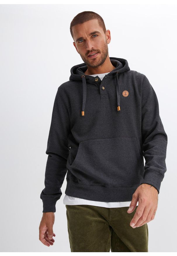 bonprix - Bluza z kapturem z detalami z imitacji skóry z miękko szorstkowaną stroną wewnętrzną. Typ kołnierza: kaptur. Kolor: czarny. Materiał: skóra. Styl: sportowy