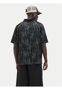 Jack & Jones - Jack&Jones Polo Retreat 12277379 Czarny Loose Fit. Typ kołnierza: polo. Kolor: czarny. Materiał: syntetyk #6